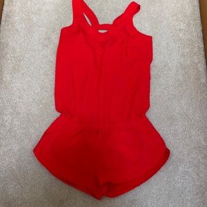 Lululemon size 8 Runsie is red.